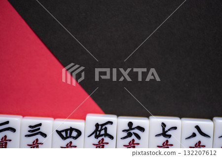 mahjong tiles lined up 132207612