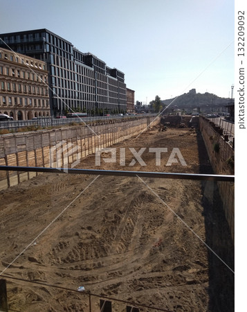 Prague, Czech republic - July 31, 2018: Large construction site excavated in urban area with modern buildings Prague, Czech republic - July 31, 2018: Large construction site excavated in urban area with modern buildings 132209092