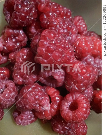 Fresh raspberries showing tiny hairs and detailed texture 132209095