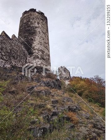 Bezdez, Czech republic - August 2, 2018: Bezdez castle tower rising above autumnal trees in czechia 132209255