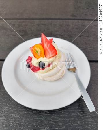 Delicious pavlova cake with fresh fruit topping in prague 132209607