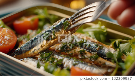 Sardines in Tin with Herbs, Cherry Tomatoes, and Arugula on Fork in Natural Light Sardines in Tin with Herbs, Cherry Tomatoes, and Arugula on Fork in Natural Light 132209987