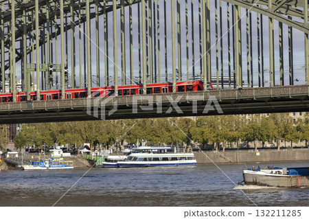 train is moving across the Hohenzollern bridge train is moving across the Hohenzollern bridge 132211285