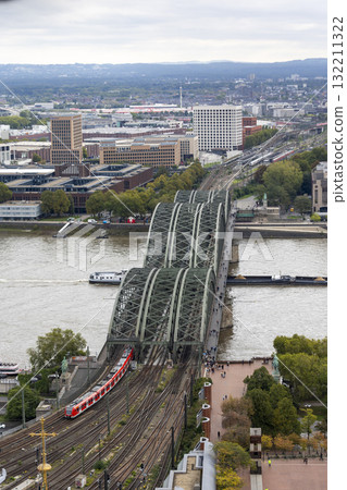 The train moves to the Cologne central station near the Hohenzollern bridge 132211322