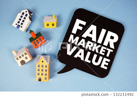 FMV Fair Market Value text with house models on blue background 132211492