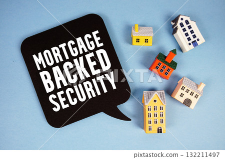Mortgage-backed Security text with house models on blue background 132211497