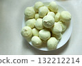 Frozen potato dumplings on a plate 132212214