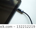View of the cable with the digital display connected to the tablet 132212219