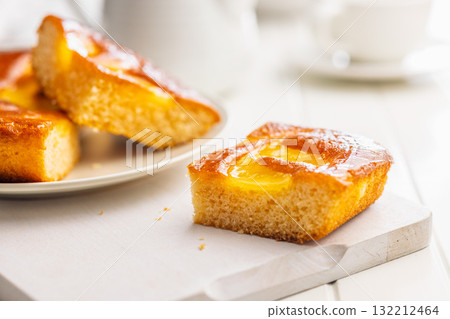 Catalana sponge cake on white table. Catalana sponge cake on white table. 132212464