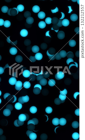 Abstract pattern of glowing blue orbs floating in darkness, creating a futuristic light composition 132212557