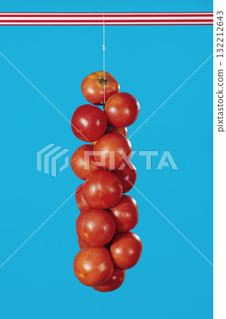 hanging Spanish tomatoes with striped bar hanging Spanish tomatoes with striped bar 132212643