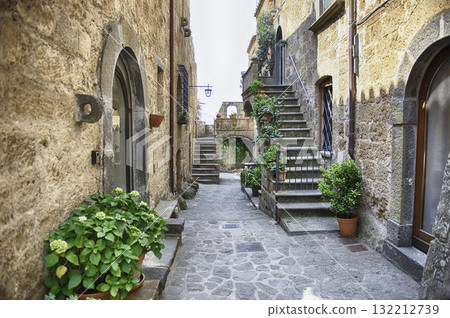 Picturesque Cobblestone Street in Ancient Civita di Bagnoregio, Italy Picturesque Cobblestone Street in Ancient Civita di Bagnoregio, Italy 132212739
