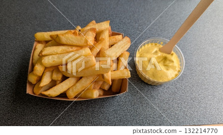 Belgian frites with coconut curry sauce 132214770
