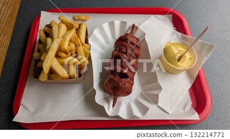 frites and spicy fried onion stick with coconut curry sauce 132214771