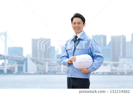 Men in work clothes, buildings 132214882