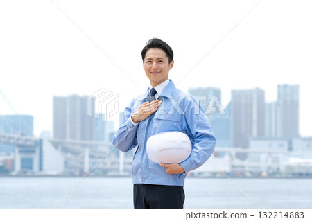 Men in work clothes, buildings Men in work clothes, buildings 132214883