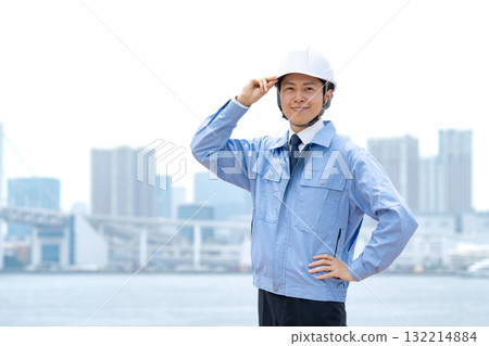 Men in work clothes, buildings 132214884