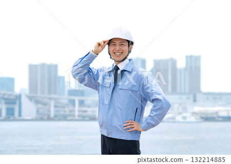 Men in work clothes, buildings 132214885