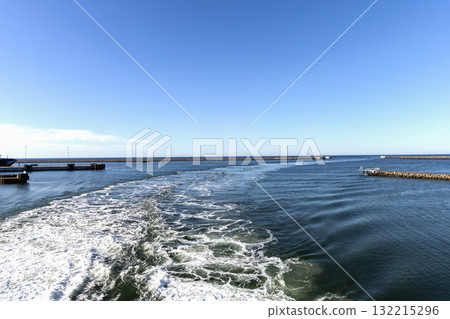 Water trail behind cruise ship. Summer travel concept. Water trail behind cruise ship. Summer travel concept. 132215296