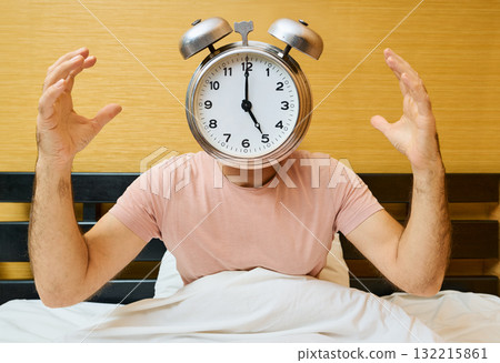 Shocked man with alarm clock instead of head has overslept. Lateness concept 132215861