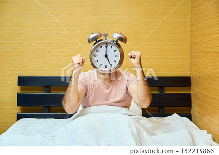 Shocked man with alarm clock instead of head has overslept. Lateness concept 132215866