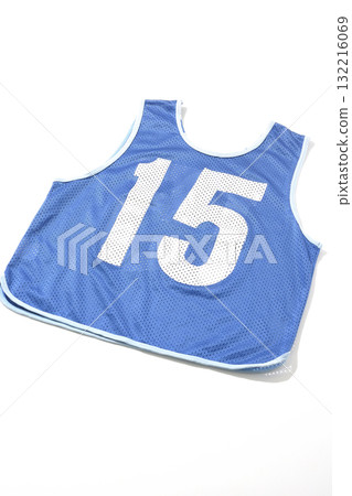 Blue bib photographed against a white background Blue bib photographed against a white background 132216069