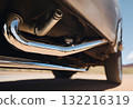Old car exhaust pipe showing rust and wear.AI Generated 132216319