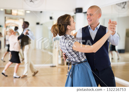 Man and woman learning to dance classical ballroom dance Man and woman learning to dance classical ballroom dance 132216753