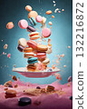 marshmallows and cookies with splashes of sauce or cream on a colored background, delicious and sweet food 132216872