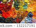 Close-up of an oil painting palette with thick, textured paint. Abstract art and creative inspiration. 132217191