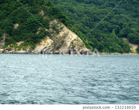 Strange rock formations seen from a sightseeing boat Strange rock formations seen from a sightseeing boat 132218010