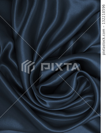 Smooth elegant dark grey silk or satin texture as abstract background. Luxurious background design Smooth elegant dark grey silk or satin texture as abstract background. Luxurious background design 132218596