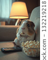 Guinea pig enjoys popcorn while watching TV in a cozy living room at night 132219218