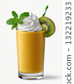 Refreshing tropical fruit drink served with whipped cream and kiwi slice on a sunny day 132219233