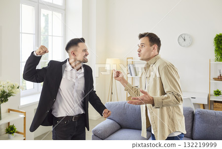 Two men in a heated argument reveal the deep tension and anger in living room 132219999
