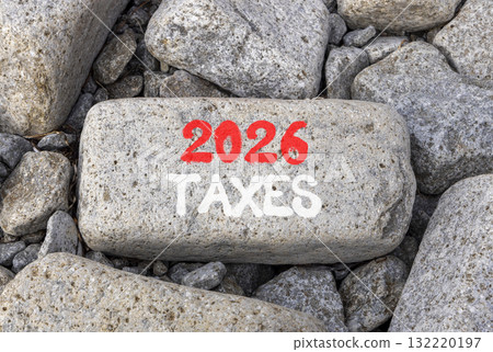 2026 taxes new year symbol. Concept words 2026 taxes on beautiful big grey stone. Beautiful grey stones background. Business and 2026 taxes new year concept. Copy space. 132220197