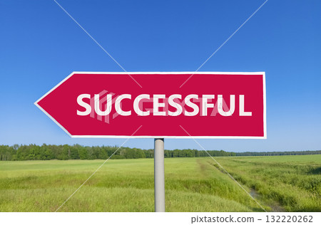 Successful symbol. Concept word Successful on beautiful red road sign. Beautiful blue sky green grass and forest peaceful nature background. Business successful concept. Copy space. 132220262