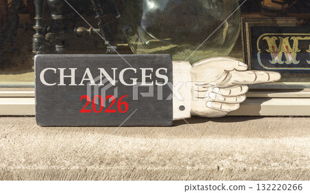 Changes 2026 symbol. Concept words Changes 2026 on beautiful black wooden hand sign. Beautiful shop display background. Business and changes 2026 concept. Copy space. Changes 2026 symbol. Concept words Changes 2026 on beautiful black wooden hand sign. Beautiful shop display background. Business and changes 2026 concept. Copy space. 132220266