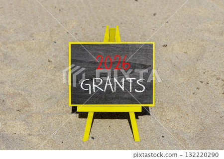 2026 Grants symbol. Concept words 2026 Grants on beautiful black blackboard. Beautiful sand beach background. Business and 2026 grants concept. Copy space. 2026 Grants symbol. Concept words 2026 Grants on beautiful black blackboard. Beautiful sand beach background. Business and 2026 grants concept. Copy space. 132220290