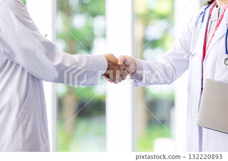 Doctor shaking hands 132220893