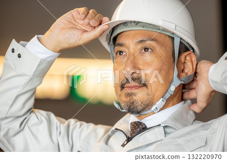 Workers working at a construction site Workers working at a construction site 132220970