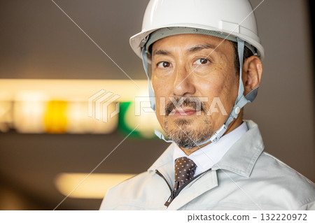 Workers working at a construction site Workers working at a construction site 132220972