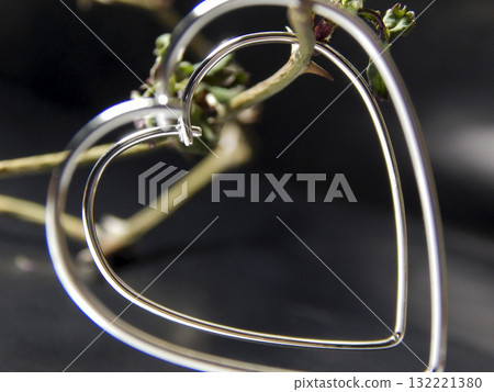 Silver heart-shaped earrings designed for elegance and charm Silver heart-shaped earrings designed for elegance and charm 132221380