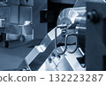 Close up scene operation of the coil spring making machine. 132223287