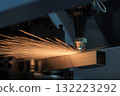 Close up scene the fiber laser cutting machine cut the stainless steel tube control by CNC program. 132223292