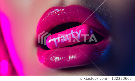 Glossy Lips and Party Capsule in Vibrant Lighting 132223603