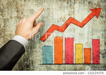 Businessman in Suit Pointing to Growing Bar Graph on Textured Background Businessman in Suit Pointing to Growing Bar Graph on Textured Background 132224379