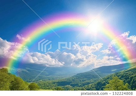 A rainbow is seen in the sky above a mountain range 132224808
