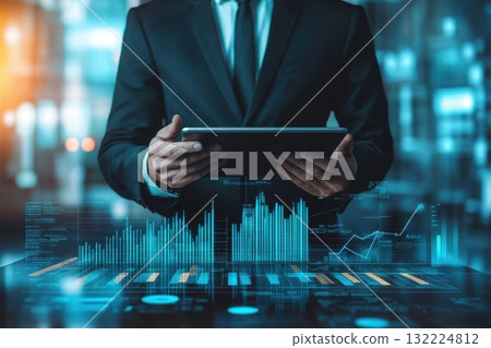 A man in a suit is holding a tablet in front of a screen with a lot of numbers A man in a suit is holding a tablet in front of a screen with a lot of numbers 132224812