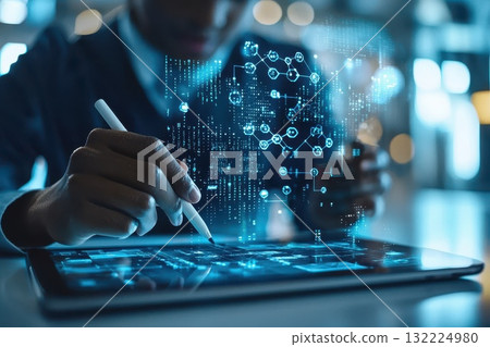 Close-Up of a Student Engaged in Digital Learning While Typing on a Tablet with Advanced Graphics and Data Visualization in a Modern Educational Environment Close-Up of a Student Engaged in Digital Learning While Typing on a Tablet with Advanced Graphics and Data Visualization in a Modern Educational Environment 132224980